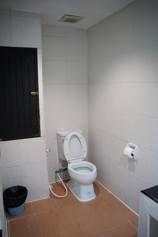 Suite bathroom with toilet